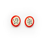 oval shaped stud earrings, the middle is white and inlaid with polka dots, the edge is orange, fitted with silver pins