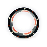 Shot of the edge of the abstract pop cuff, displaying the white and orange pattern inlaid in the black resin.