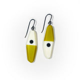 asymmetrical long diamond shaped earrings in a minimalist design of olive, black and white resin. Hung on oxidised sterling silver.