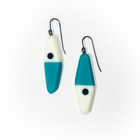asymmetrical long diamond shaped earrings in a minimalist design of teal, black and white resin. Hung on oxidised sterling silver.
