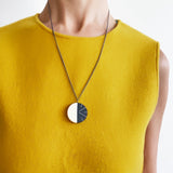 Black and white Modernist Lunula Necklace worn  model