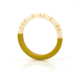 Handmade statement slim bracelet cast in lime green and cream resin