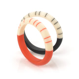 black and tangerine orange resin geometric bracelets  ornate with stripes