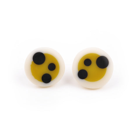 Mustard green and white round stud earrings, handmade from resin and silver and ornate with black polka dots
