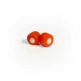 Tangerine orange resin stud earrings inlaid with a white dot. Fitted with Sterling silver pins.