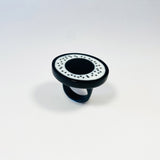Large Monochrome Cocktail Ring With Dots on a white background