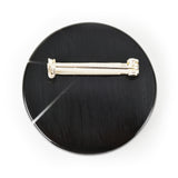 Back of the a Zazou black brooch displaying the Sterling silver pin fitted with a safety catch