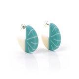 Modernist disc earrings, handmade from teal and white resin. Tactile and lightweight, they are fitted with Sterling silver pins and butterfly backs.