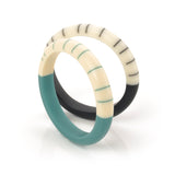 colourful handmade slim bracelets cast in minimalist stripy design