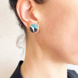 Teal, black and white Confetti stud earrings worn by model