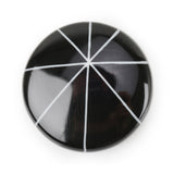 Handmade resin black brooch, inlaid with an Atomic style design in white