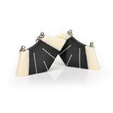 Deco style dangle  earrings in black and white resin . Hooks and chain are Sterling silver. Handmade from start to finish in my Brighton studio.