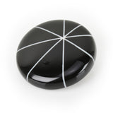 Atomic style handmade brooch cast in black and white resin