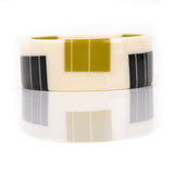 Designer resin cuff in ivory white, chartreuse green and black 