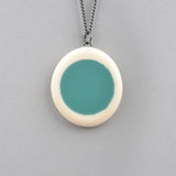 teal and white oval shaped  necklace, handmade from resin and Sterling silver.