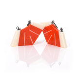 Deco drop earrings in orange and cream resin. Sterling silver fitments.