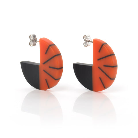 Resin Disc Earrings cast in orange and black resin
