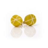 Geometric resin Zazou stud earrings cast in mustard green and white