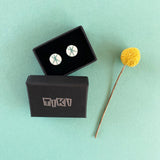 Geometric Zazou circle resin stud earrings presented in Tiki gift box