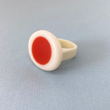 Orange and white resin pebble-shaped Nabu statement ring