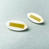 mustard green leaf stud earrings handmade from resin ands silver